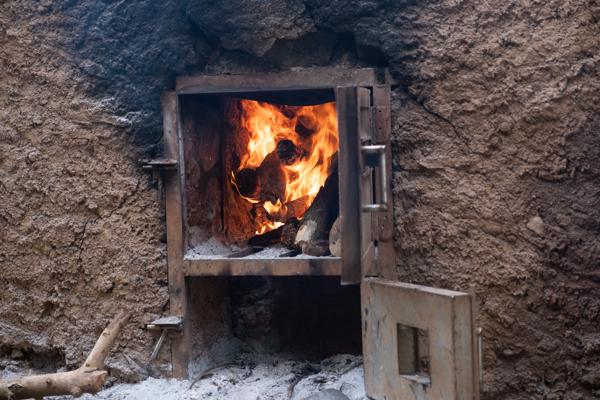 Wood-Fired Oven Burning in an Earthen Wall, Grande Comore (Comoros) Moimbao, Comoros
