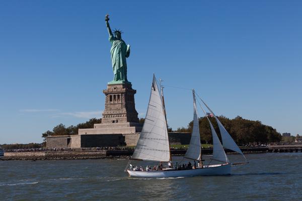 Sailboat Passing the Statue of Liberty, New York Harbor New York, United States