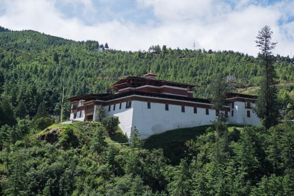 Bhutanese dzong on a forested hillside near Thimphu, Bhutan Thimphu, Bhutan