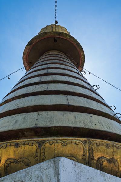 Looking up at a Bhutanese chorten spire near Thimphu, Bhutan Lakhu Tshowogm, Bhutan