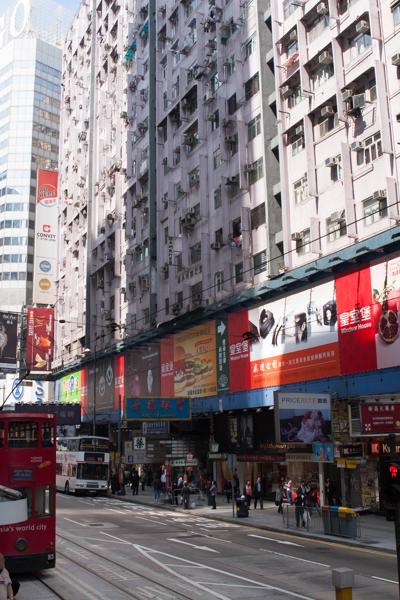 Street scene with Hong Kong tram and dense apartment blocks (Wan Chai/Causeway Bay, Feb 2009) Hong Kong, China