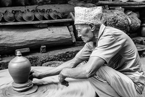 Potter Shaping Clay on a Wheel in Nepal Bhaktapur, Nepal