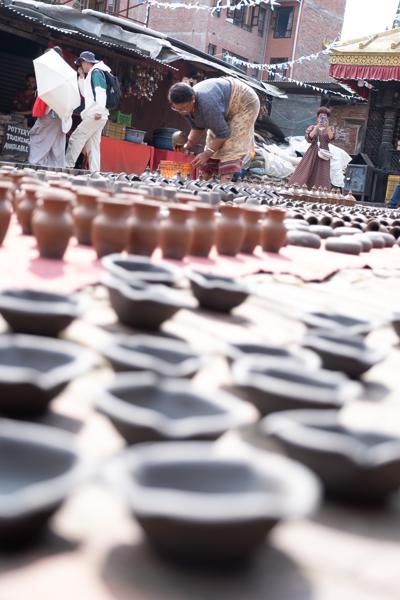 Row of clay pots at an outdoor market in Kathmandu Bhaktapur, Nepal