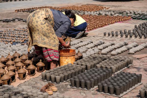 Nepalese Pottery Workshop: Rows of Clay Vessels Being Shaped Bhaktapur, Nepal