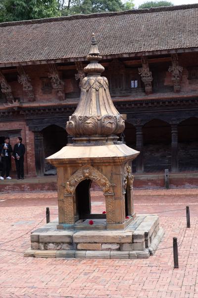 Ornate Nepalese stone shrine in a historic courtyard Lalitpur, Nepal