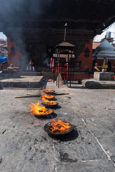 Temple Courtyard with Burning Oil Lamps in Kathmandu, Nepal Lalitpur, Nepal