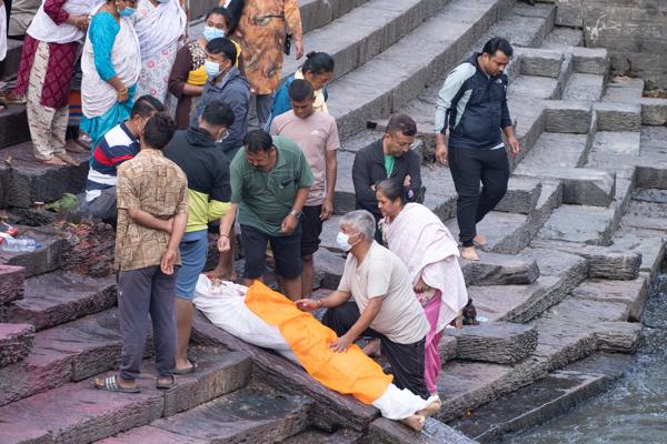 Funeral Gathering on Riverfront Steps in Kathmandu Kathmandu Metropolitan, Nepal