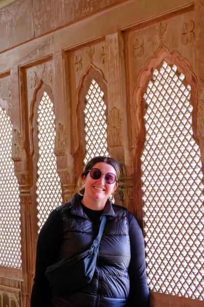 Portrait by carved jali windows in a Rajasthani palace corridor (Bikaner, India) Bikaner, India