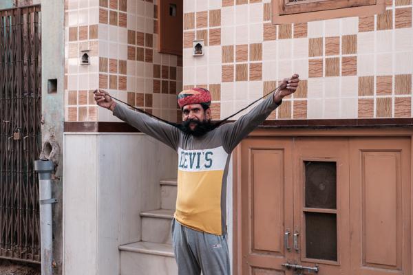 Man Stretching His Beard in a Bikaner Alley, Rajasthan (2023) Bikaner, India