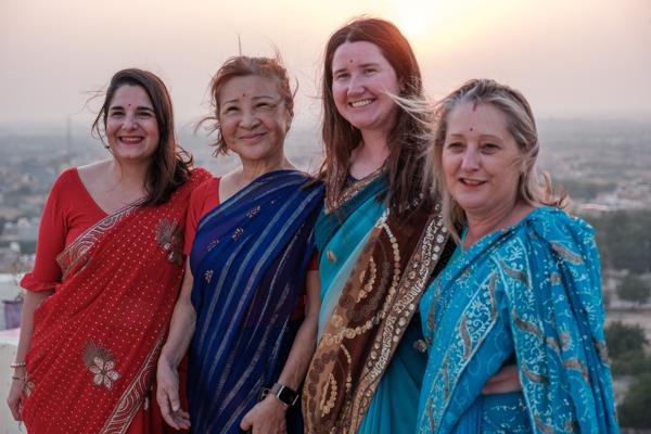Four Women in Colorful Sarees at Sunset, Jaisalmer (Rajasthan, India) Jaisalmer, India