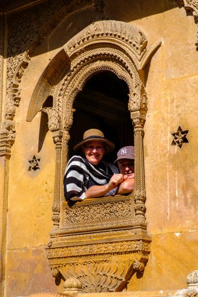 Tourists at a Carved Jharokha Window, Jaisalmer Fort Jaisalmer, India