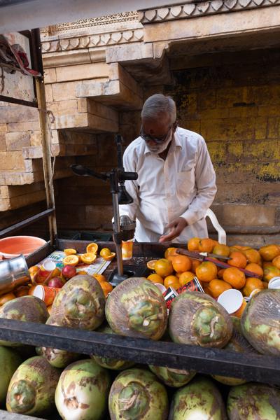 Orange Juice Vendor at a Street Stall in Jaisalmer, Rajasthan Jaisalmer, India