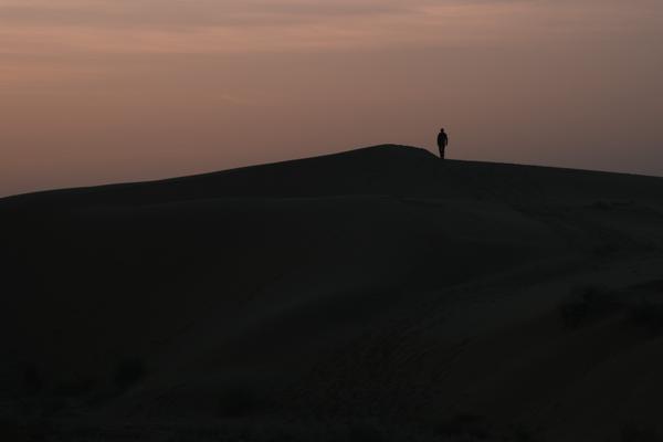 Silhouette on a Thar Desert Sand Dune at Twilight Damodara, India