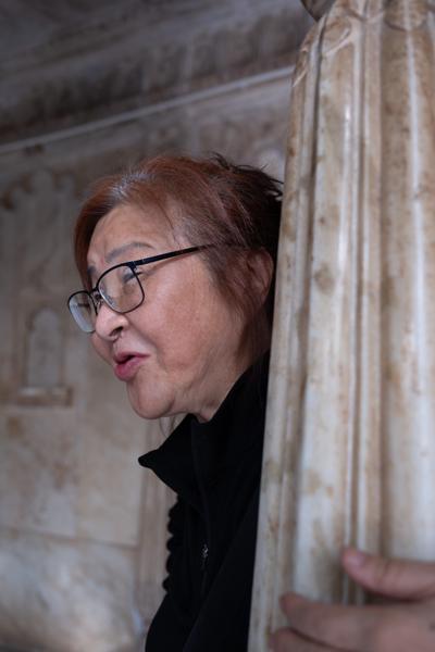 Woman Peeking from Behind a Marble Column, City Palace Udaipur Udaipur, India