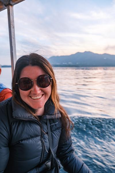 Smiling passenger on a sunset boat ride in Udaipur, India Udaipur, India