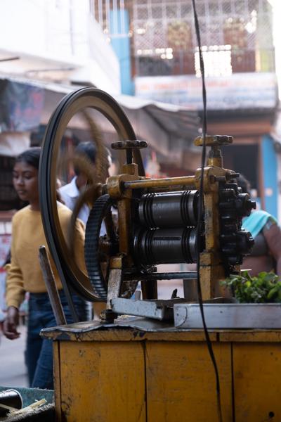 Sugarcane Juice Press at a Street Market in Ajmer, Rajasthan Pushkar, India
