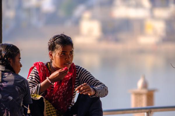 Girls sitting by Pushkar Lake, Rajasthan Pushkar, India