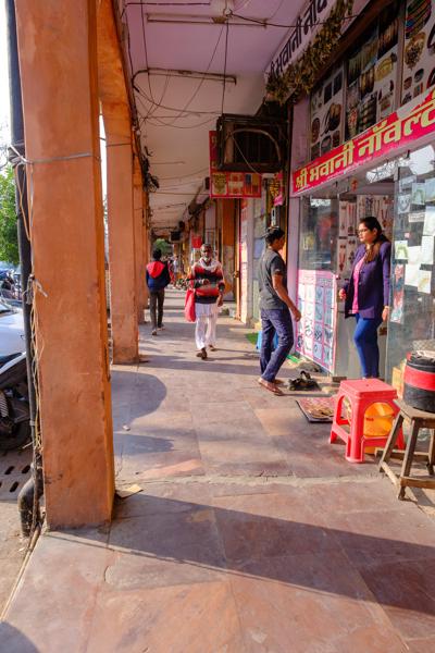 Morning shoppers under a colonnaded market arcade in Jaipur Jaipur, India