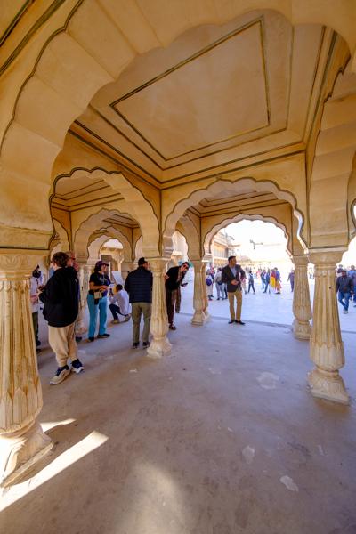 Tourists Under Mughal-Style Arches at Amber Fort, Jaipur Jaipur Municipal Corporation, India