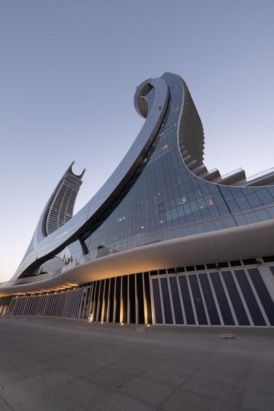Futuristic Glass Tower at Twilight in Doha Qatar