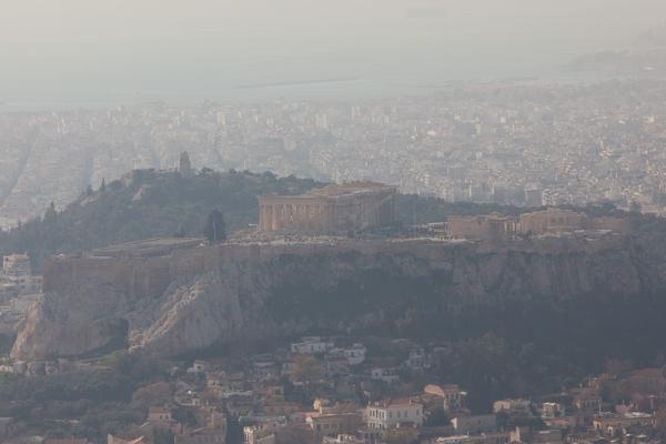 Parthenon on the Acropolis with Athens in haze Athens, Greece