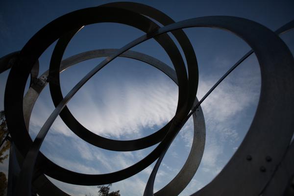 Abstract Steel Rings Sculpture Over Athens Sky Athens, Greece