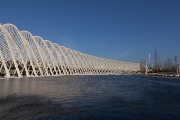 Long White Lattice Archway by a Reflective Pool in Athens Municipality of Nea Ionia, Greece