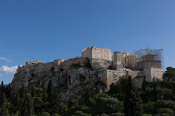 The Acropolis of Athens under a Clear Blue Sky with Scaffolding on the Parthenon Athens, Greece