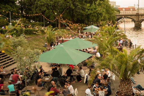Riverside beer garden in Berlin at dusk Berlin, Germany