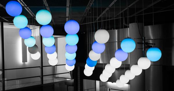 Blue and white hanging globe lights in Berlin atrium Berlin, Germany