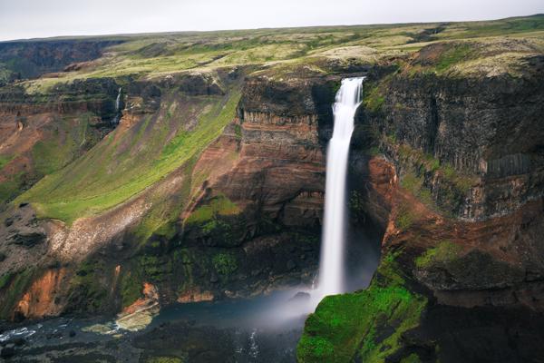 Icelandic Canyon Waterfall Plunging Over Basalt Cliffs Iceland