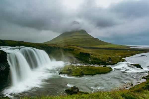 Kirkjufell and waterfall in Iceland under moody skies Grundarfjarðarbær, Iceland