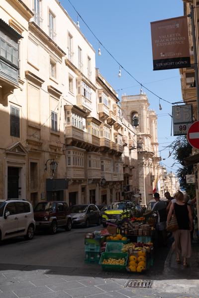 Sunlit street market in Valletta, Malta Valletta, Malta
