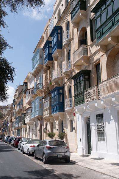 Sunlit row of traditional Maltese balconies in Valletta Valletta, Malta