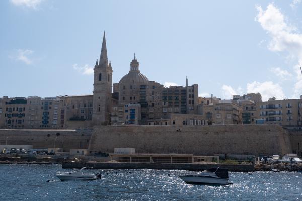 Valletta waterfront with basilica dome and spire Valletta, Malta