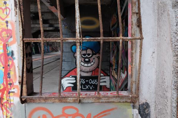 Rusty Bars Framing Street Art Scene Bezirk Lebern, Switzerland