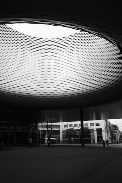 Circular perforated dome over an urban plaza Basel, Switzerland